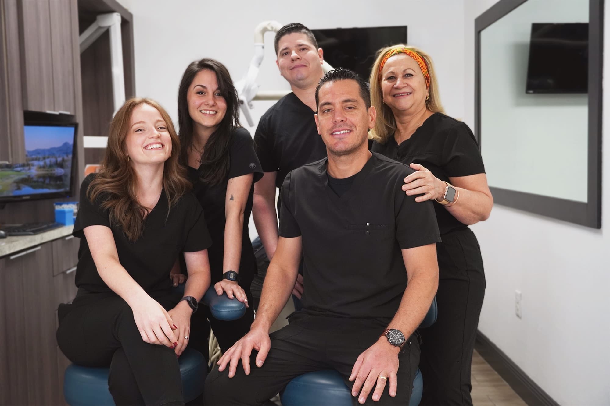 The Hialeah City Dental team gathered in a treatment room